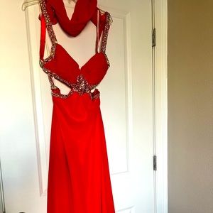 This is light red Jazz Couture prom dress